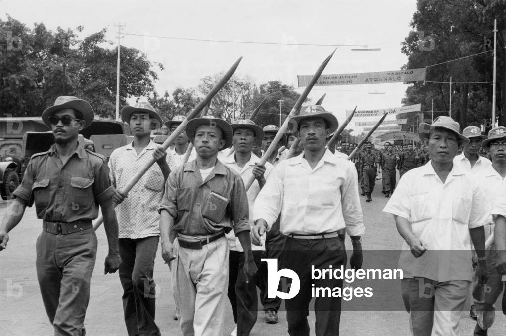 Civilians are parading to celebrate 17th anniversary of Indonesia independance in main street of Djakarta on August 16, 1962