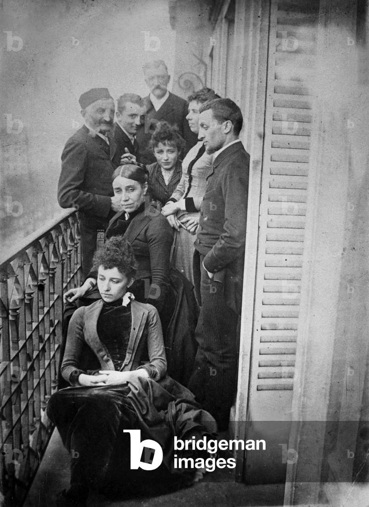 Camille Claudel (1864-1943) and her family in 1883 : she is in the center behind her mother Louise Athanaise, her father Louis Prosper is on the left, her sister Louise is seated on front row and her brother Paul is right