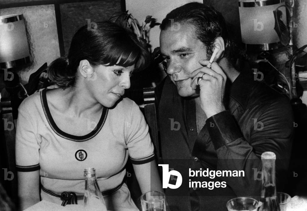 Christina and Alexandros Andreadis talking at the reception held after the award ceremony to the winners of the Antica rally at the Athenes Automobile Club on October 2, 1975
