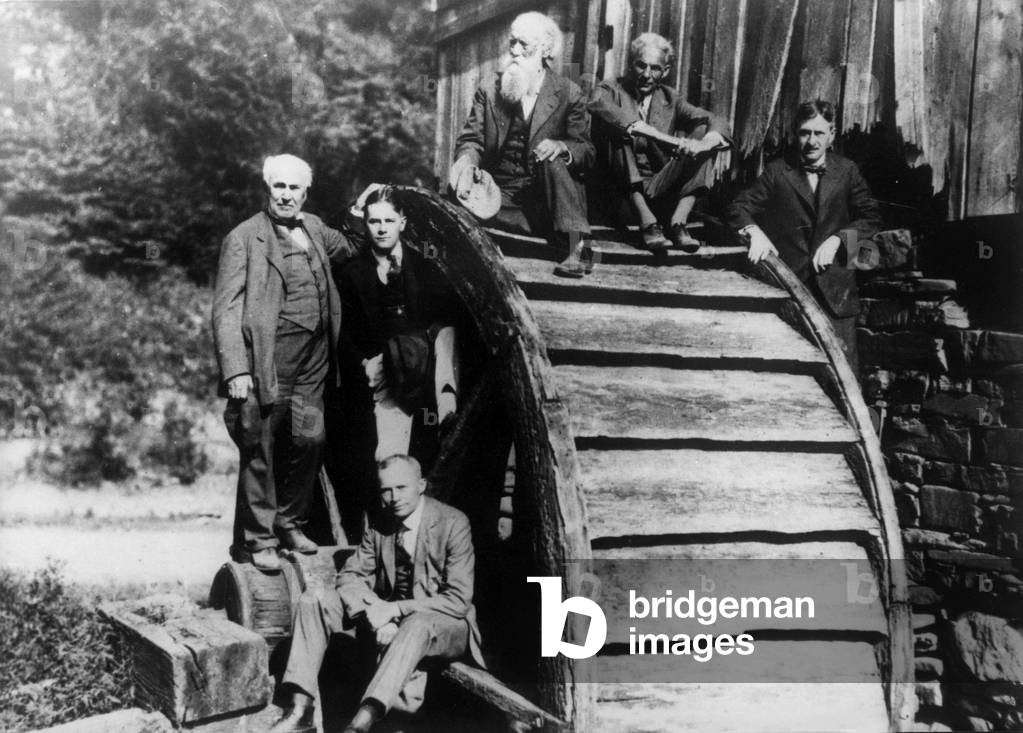 On a camping trip at an old grist mill in West Virginia. Left to right: Edison, Harvey S. Firestone, Jr., John Burroughs, Henry Ford, Harvey S. Firestone. Seated at bottom: R.J.H. Loach, 1918