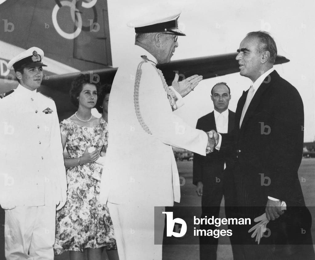 King Paul 1st of Greece greeted by greek Prime Minister Constantine Karamanlis at Athens airport (back from eye operation) June 29, 1959
