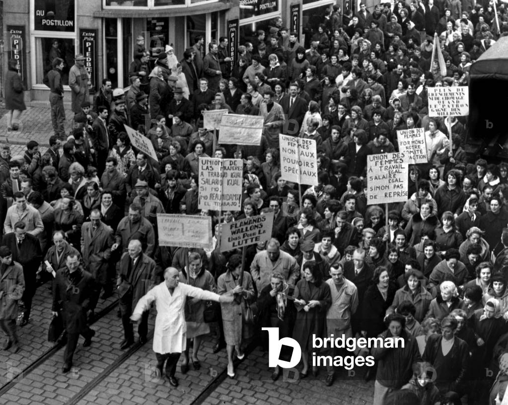 Women on strike at weapon fActory in Herstal (Belgium) : demonstration for equality of salaries between men and women, April 16, 1966