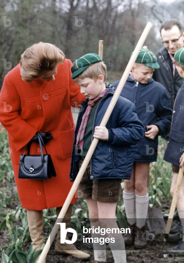 The Queen of Belgians Fabiola and her nephew the Prince Philippe of Belgium, Duke of Brabant, son of AlbertII, wears with his scout costum; on April 25th, 1969