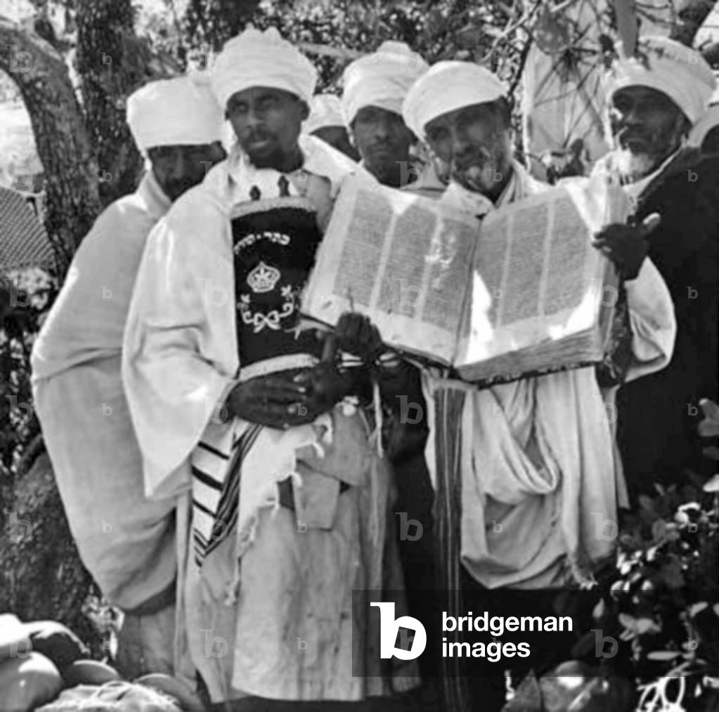 Falashas arriving in Israel with sacred scrolls, 1984 (b/w photo)