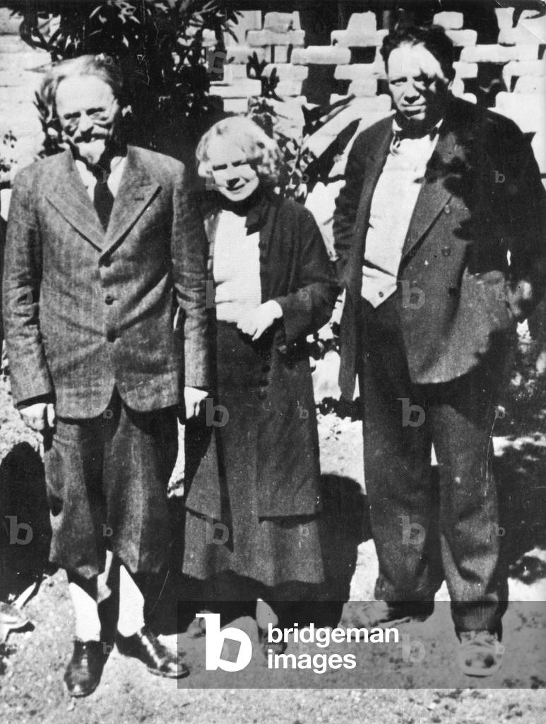 Leo Trotsky (1879-1940) and his wife Natalia in Mexico , on the right is artist Diego Rivera who took in Trotsky, 1937