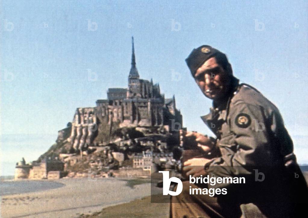 Photographer Robert Capa at the Mont St Michel, after Normandy landings, July 1944