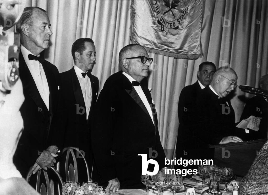President of Venezuela Romulo Betancourt at Waldorf Astoria hotel in New York for a diner in his honour, listening speech of Cardinal Francis Spellman, on June 22, 1963