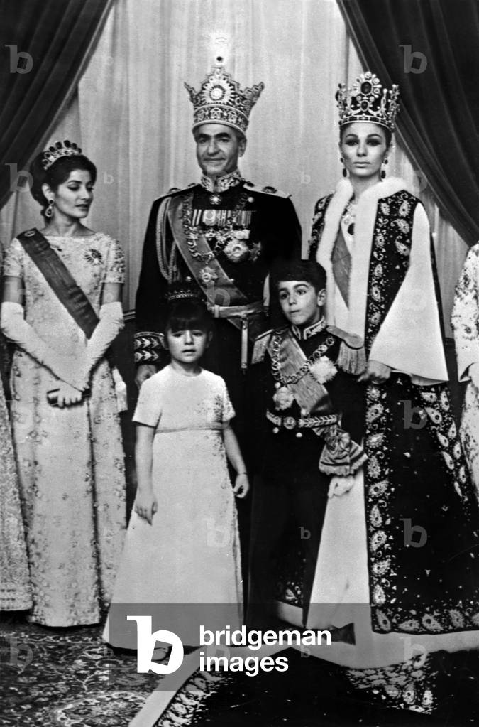 official photo of the royal family of Iran : Chah Mohammad Reza Pahlavi and his wife Farah Diba Pahlevi empress of Iran, with their son prince Reza, their daughter Yasmine Farahnaz and (left) Princess Chahnaz , the Shah's first daughter October 26, 1967 (coronation of Farah Diba)