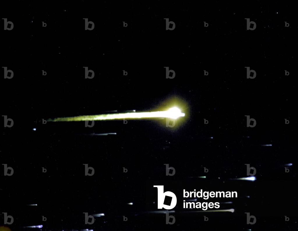 This Apollo 8 reentry photograph was taken by a U.S. Air Force ALOTS (Airborne Lightweight Optical Tracking System) camera mounted on a KC-135A aircraft flown at 40,000 ft altitude. Apollo 8 splashed down at 10:15 a.m., December 27, 1968, in the central Pacific approximately 1,000 miles South-Southwest of Hawaii