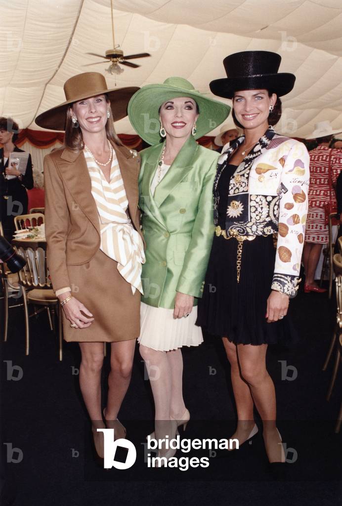 Susan Sangster, wife of racehorse owner Robert, with actress Joan Collins and Victoria Tucker, a long-time friend and girlfriend of Lord Blanc, in June 1992
