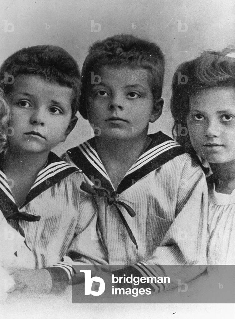 Antoine de Saint Exupery (c, 1900-1944) with his brother Francois and one of his sisters