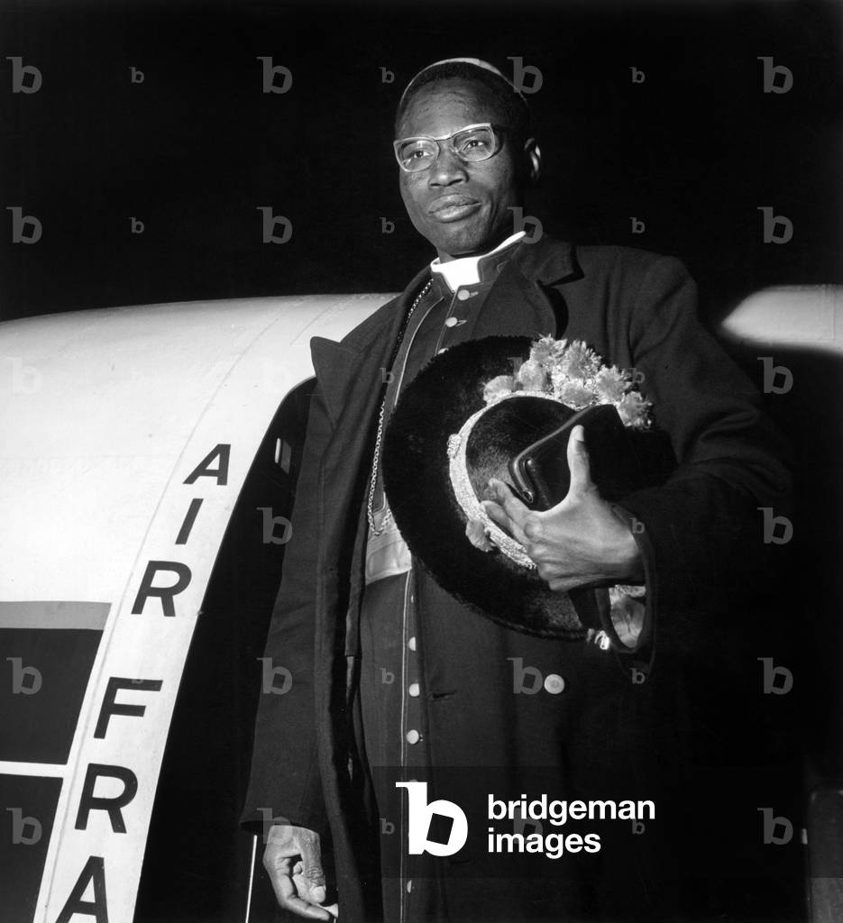 Neg: A8193PL Monsignor Zoungrana Archeveque d'Ouagadougou first African cardinal named Paul VI here before his departure aboard Air France's scheduled caravel to Frankfurt on March 9, 1965