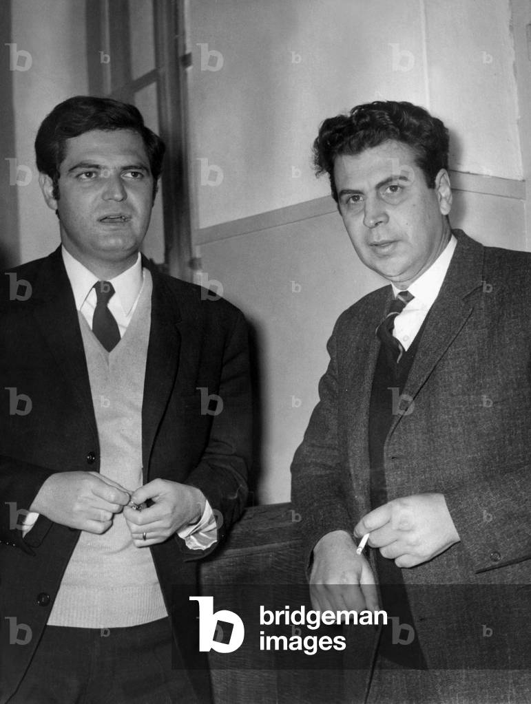 Mikis Theodorakis (r) with his lawyer in Athens, Greece for his trial, January 23, 1968