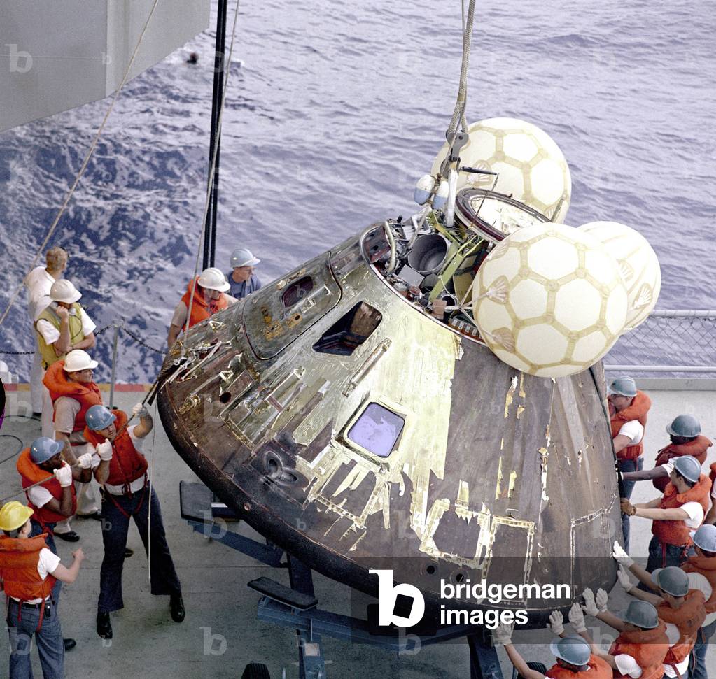 Space module of Apollo XIII hoisted from pacific ocean aboard U.S.S. IwoJima after its accident (explosion due to technical misfunction) April 17, 1970 - conquete de l' espace conquest of space NASA