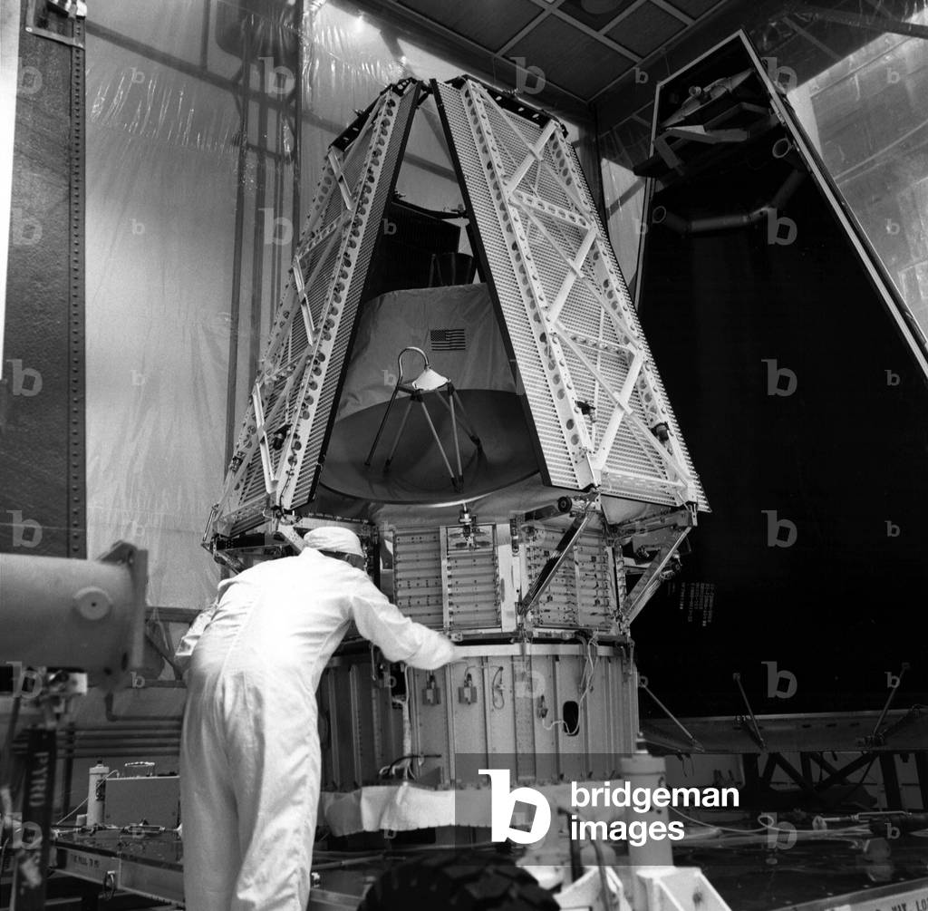 A technician checks the Mariner I spacecraft prior to its encapsulation for launch to Mars. An Atlas-Centaur rocket successfully launched the mars-bound spacecraft from Cape Kennedy at 6:23 p.m. EDT, May 30, 1971