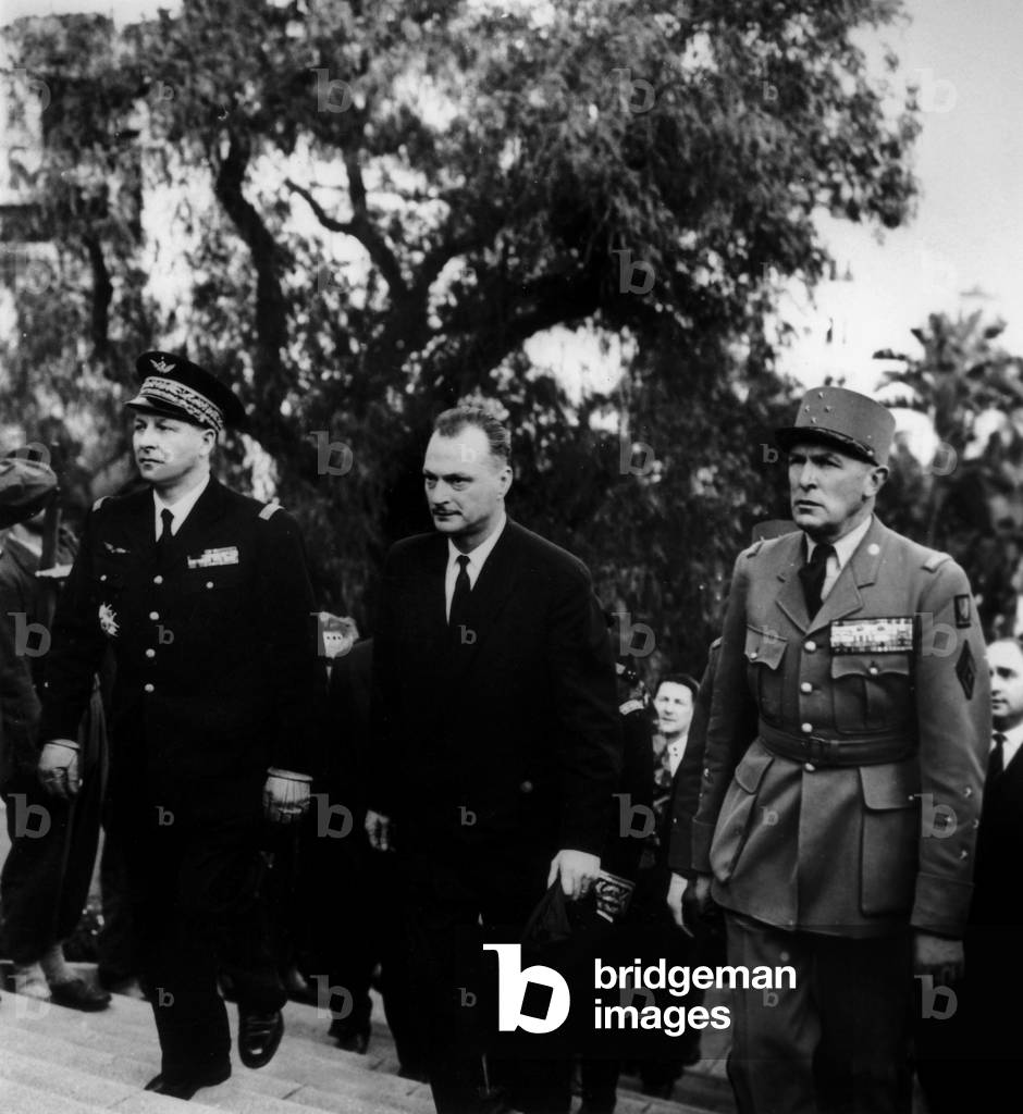 General Challe, Paul Delouvrier director of civilian services in Algeria, and General Allard walking to the war memorial in Algiers December 19, 1958 during the war