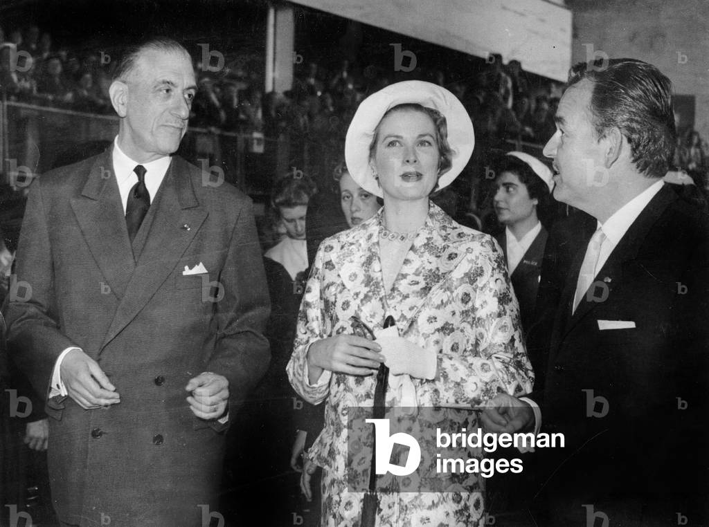 prince Rainier III and Princess Grace of Monaco visiting the Brussels fair, here visiting the French pavillion with Pierre De Gaulle (brother of CharlesDeGaulle) June 21, 1958