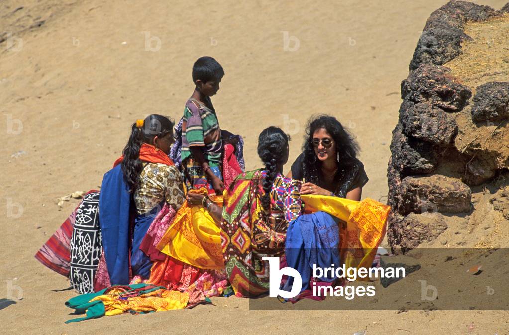 Beach in Goa (India) Women and children on the beach in Goa (India)