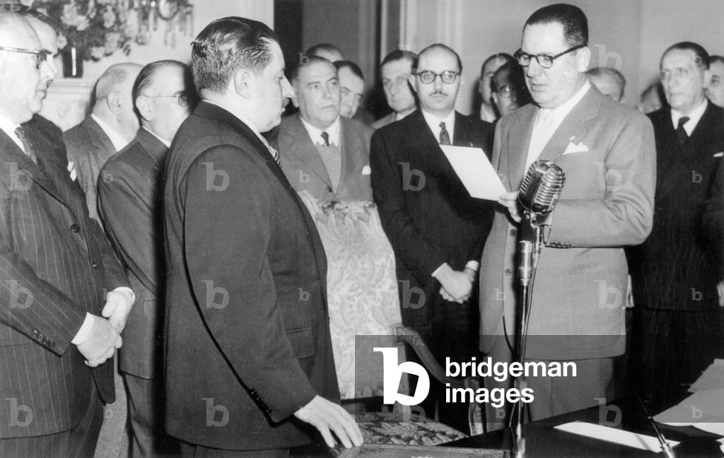 Oscar Albrieu minister of interior taking oath to President Peron and the new Peron government July 6, 1955 before the military putsch which led to Peron's fall (September 16, 1955 ) revolution