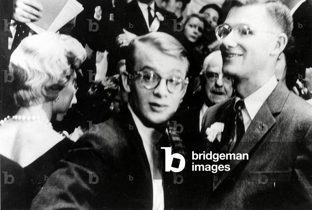 Nelson Rockefeller Jr, son of MargarettaHappyFitler and Nelson Rockefeller (vice President and former governor of New York) with his half brother Mickael Rockefeller (son of MaryTodhunterClark and Nelson Rockefeller) during a meeting in new York on November 5, 1958. Michael dead in 1961 in a canoe accident in New Guinea