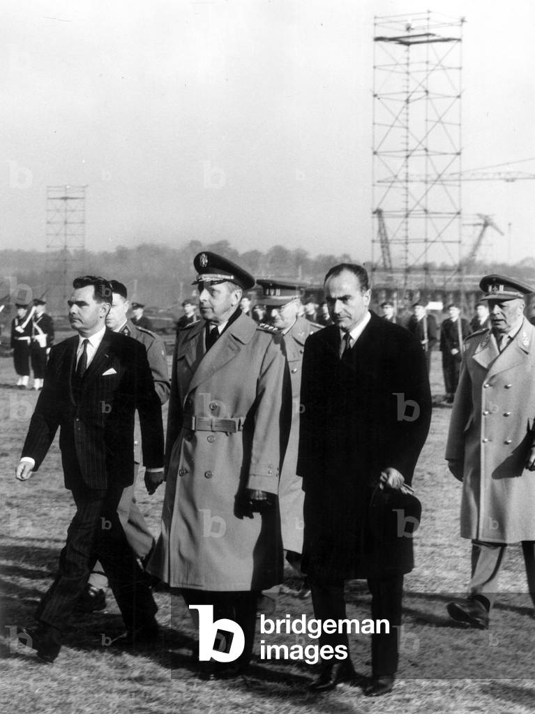 Neg: A25977PL General Lyman Lemnitzer (Supreme Commander of Allied Forces in Europe) in the presence of Mr Van Den Boeymants (Belgian Prime Minister) at the inauguration of the Shape works in Casteau (Belgium) on 18 November 1966