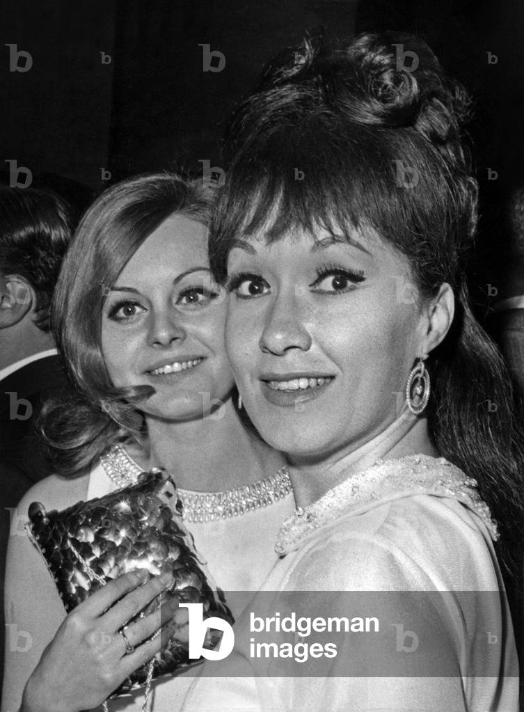 Lolita Torres and Rocio Durcal during an evening organized for journalists artists and Spanish singer in Madrid on 6 April 1967