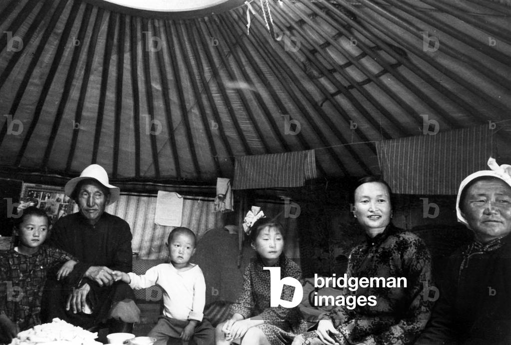 peasant family living in a yurt in the Tuya farm in South Gobi, Mongolia in December 1964 (the man is a goat shepherd, and he lives with his five children, his daughter and his wife)