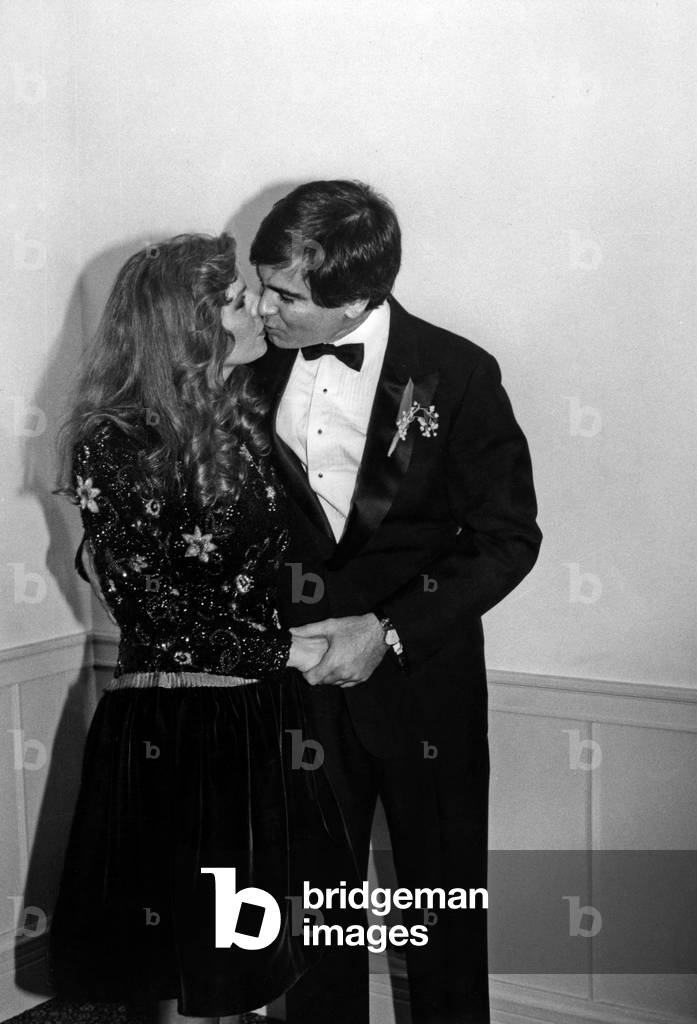 Yasmina Khan, daughter of AliKhan and RitaHayworth, kissing her husband Christopher Jeffries February1989 after their Wedding, Plaza Hotel, New York