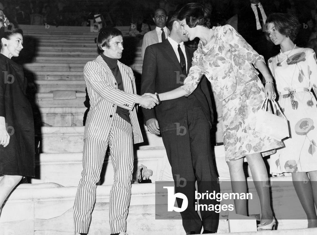 Margot Fonteyn and Rudolf Nouyeev meeting Princess Anne Marie and Princess Irene of Greece at premiere of 