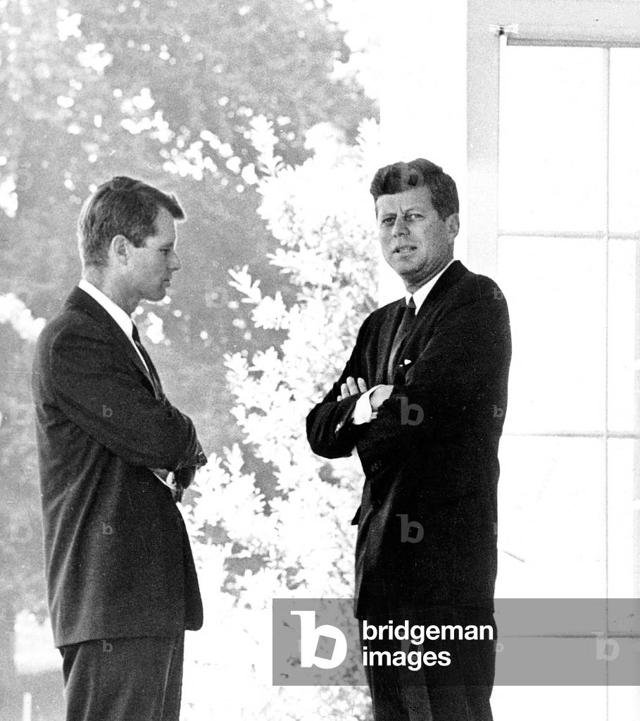 Attorney General Robert Kennedy consults with brother President John Kennedy at the White House, 1962 (photo)