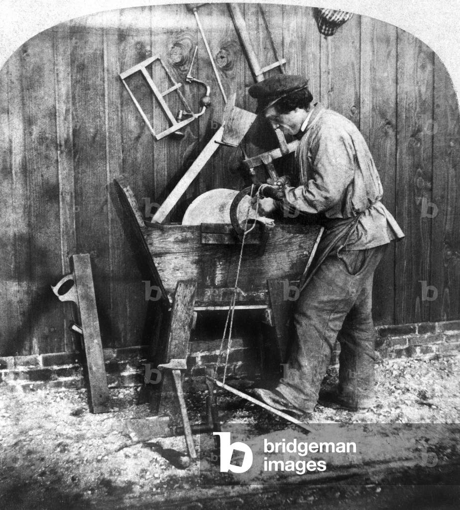 Knife Sharpener, France (b/w photo)
