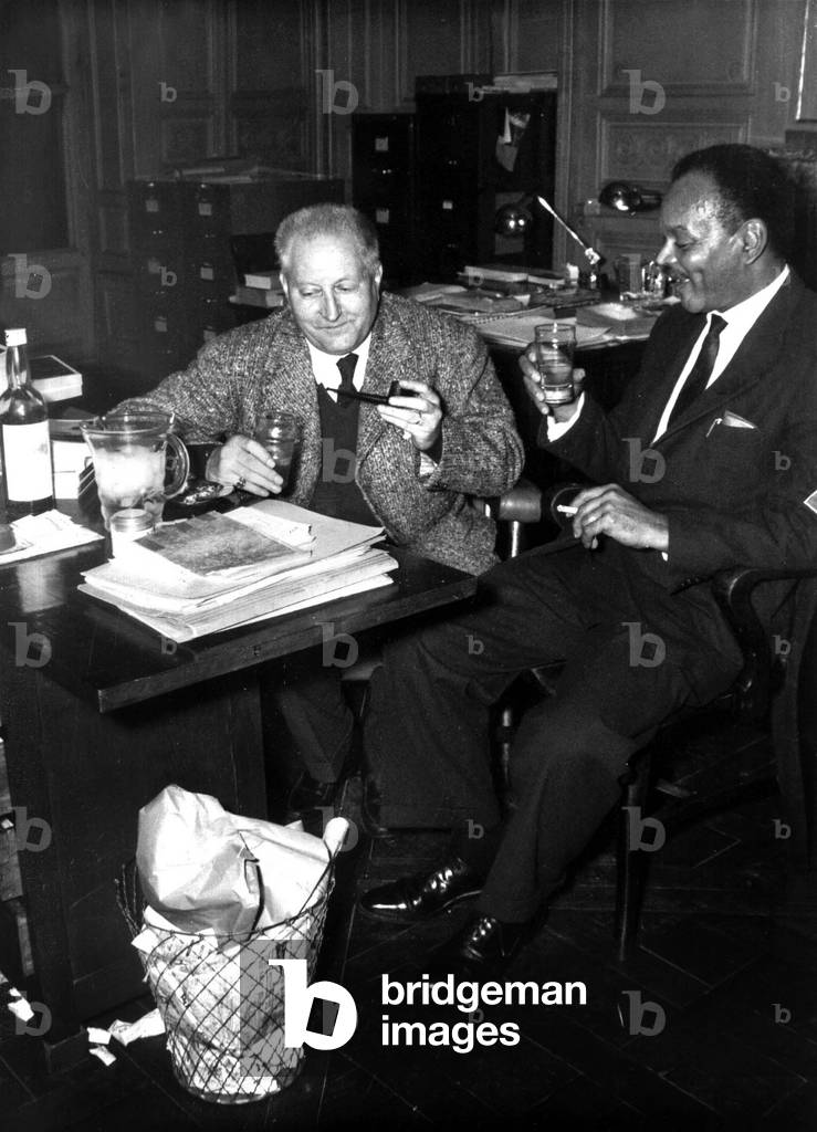 Writers Jean Giono (1895-1970) and Chester Himes (1909-1984) in Paris in 1958