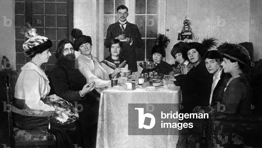 Grigori Efimovitch Rasputin (1869-1916) surrounded by some of the women drawn by his magnetic personality on l of Rasputin : Anna Vyroubova (1884-1964) and Matriona Rasputin (b1897), the eldest daughter of Rasputin c. 1915