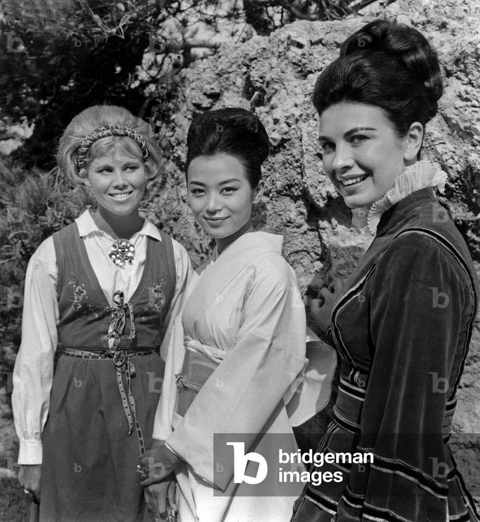 From left to right Miss Norway Eva Carlberg Miss Japan Minao Dannaka and Miss England Diana Westbury in Folk Costume in Palma de Mallorca June 29, 1964