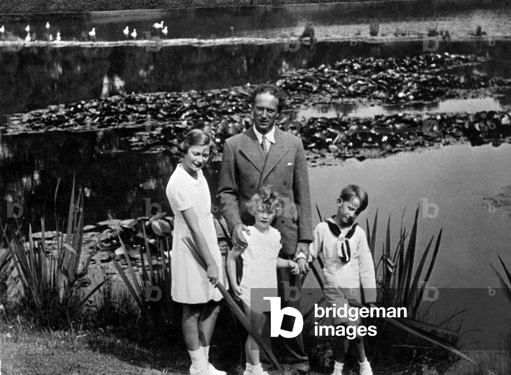 King Leopold III of Belgium with his children (l-r) : Josephine-Charlotte (b1927, future grand duchess of Luxemburg), Albert (b1934, future King  Albert II), Baudouin (b1930, future King  Baudouin 1st), photo taken by queenElisabeth of Belgium King  Leopold's mother-in-law at Laeken castle in August 1937