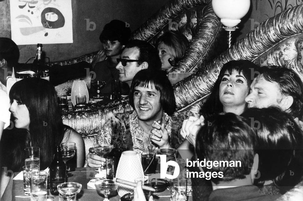 Cher, Sonny, Elizabeth Taylor, Richard Burton, M. and Mrs Andy Williams at a party in Whiskey-A-Go-Go, Hollywood 3 November 1965