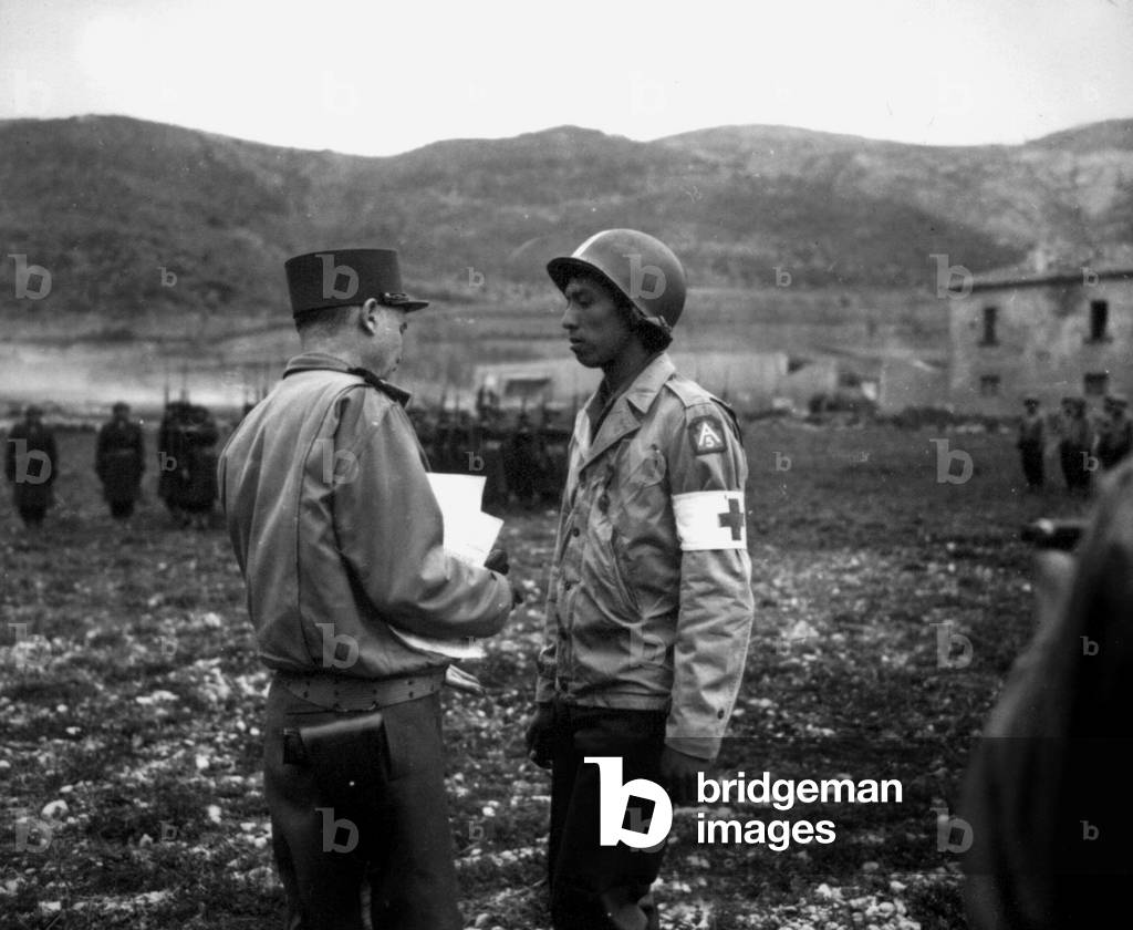 Private Jonathan Hoag is awarded the Croix de Guerre by French General Alphonse Juin, Italy, 21st March, 1944