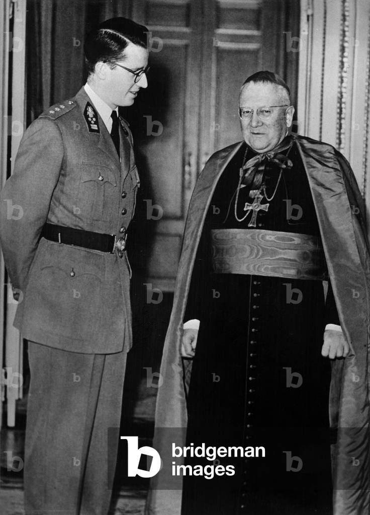 The King  of Belgians Baudouin receiving Maurice Feltin, the cardinal, Paris archbishop in Brussels, January 28, 1957