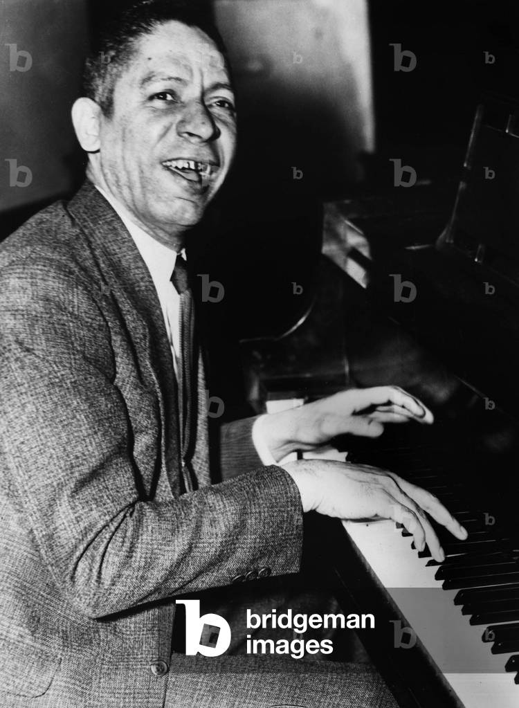 Jelly Roll Morton (1885/1890-1941, real name Joseph Ferdinand Lamothe) at the piano c. the late 30's