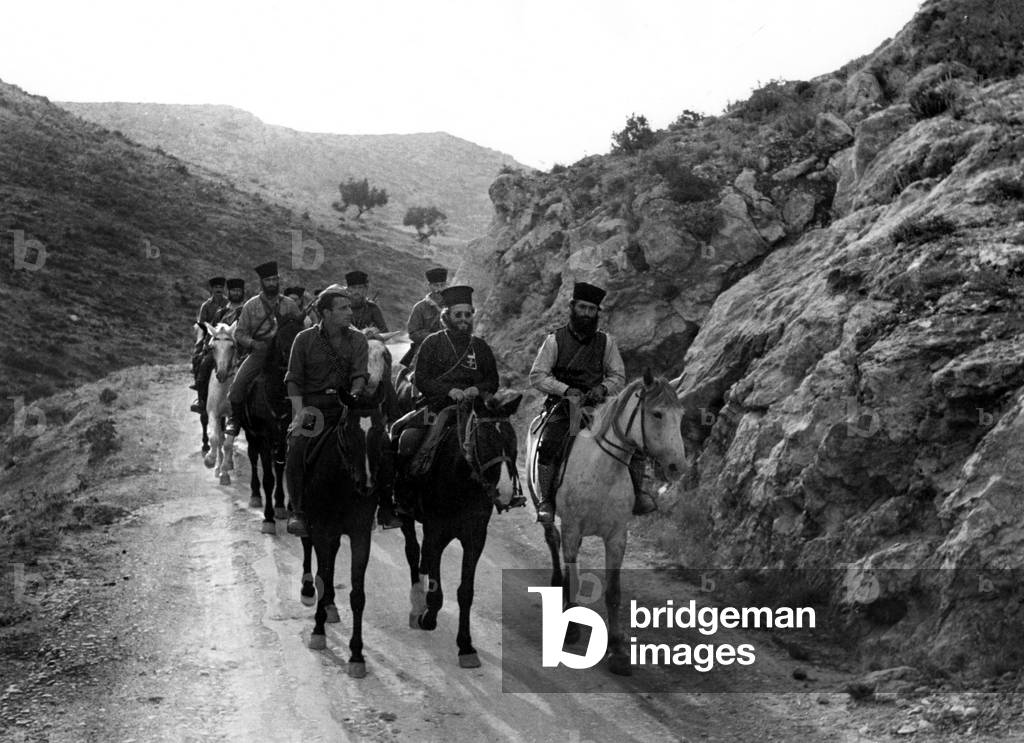 Members of the Commander's special guard accompany the patrol through the hills. Greece, October 19th, 1944.