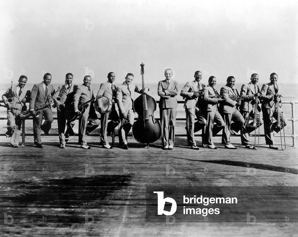 The Fletcher Henderson Orchestra l-r : Russell Proscope, Coleman Hawkins, Edgar Sampson, Clarence Holiday, Walter Johnson, John Kirby, Fletcher Henderson, Russell Smith, Bobby Stark, Rex Stewart, JC Higginbotham and Sandy Williams c. 1924