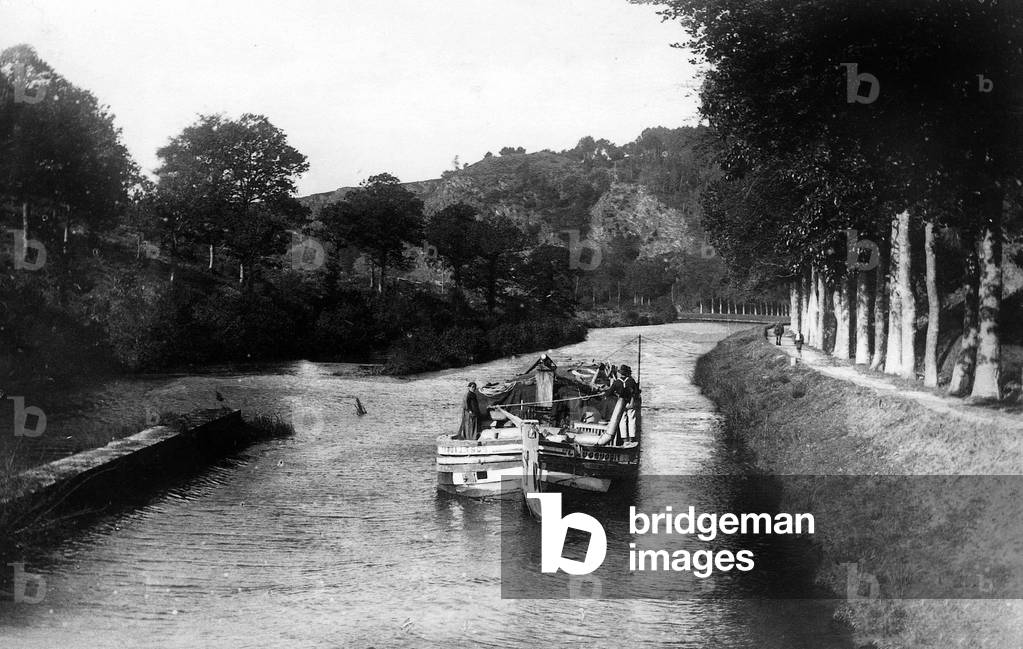 A towhorses pull a barge on the Canal de Nantes in Brest near Jouarec, Brittany, 1895