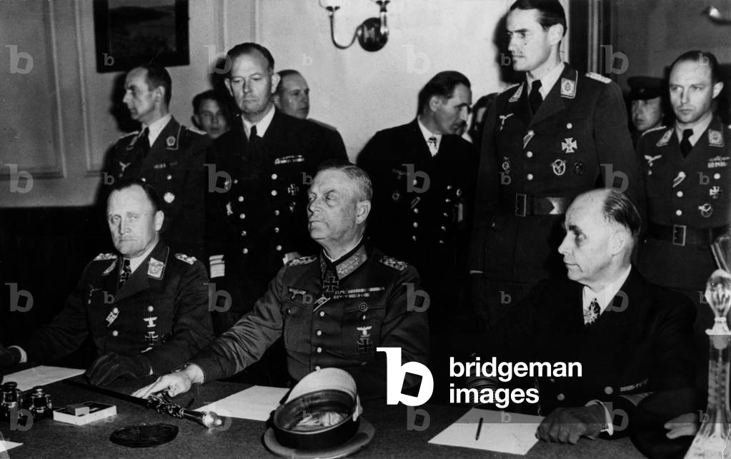 The leaders of the three armies during signature of the German capitulation : l-r : General Hans Juergen Stumpff, Luftwaffe commander-in-chief, marshal Wilhelm Keitel, Wehrmacht chief of Staff, General admiral Hans Georg Von Friedebourg Kriegsmarine commander-in-chief on May 8, 1945 in marshal Joukov headquarter in Berlin, photo NARA