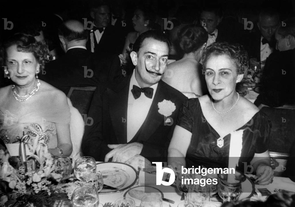 Painter Salvador Dali with Elizabeth Furtwanger and Mrs Rene Fribourg ((Leah Fribourg Kuba) in April 1952, at the Waldorf-Astoria Hotel, New-York.