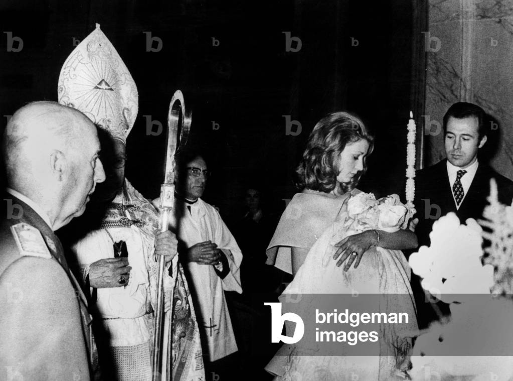 Maria del Carmen Martinez Bordiu y Franco (the eldest of Franco's grand-daughters and daughter of marquis of Villaverde), duchess of Cadix, here holding her child Francisco Alfonso Jaime Cristobal y Victor during baptism ceremony December 21, 1972 with great-grandfather General Franco , godfather of the child