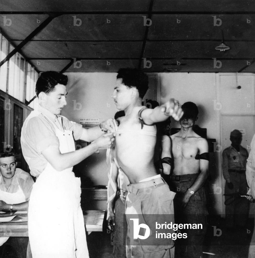 Algerian conscripts draftees having medical examination on August 29, 1957