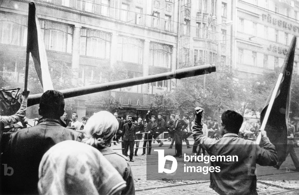 soviet in Czechslovakia : here czech people with flags facing russian tanks in Prague September 15, 1968