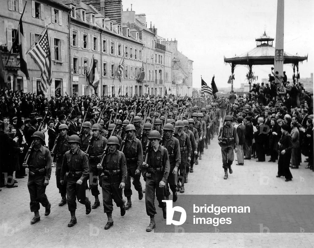Parade of American Soldiers, Cherbourg, Normandy, France, July 14, 1944 (b/w photo)