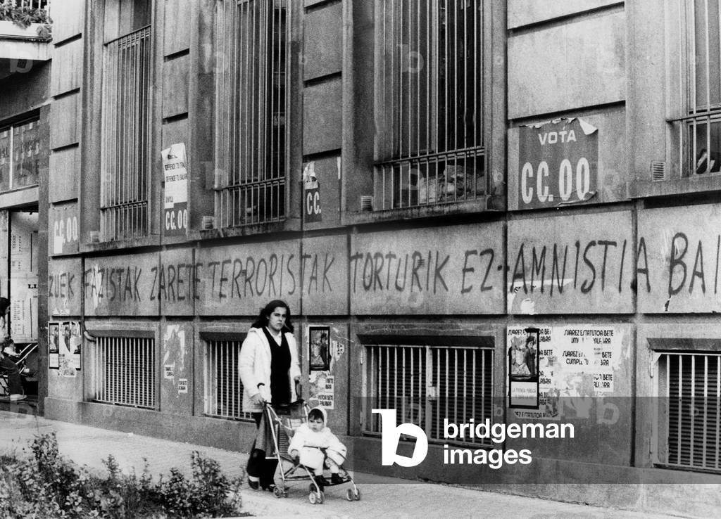 Posters and graffitis of the E.T.A. in San Sebastian in the basque country 02/04/1981 (b/w photo)
