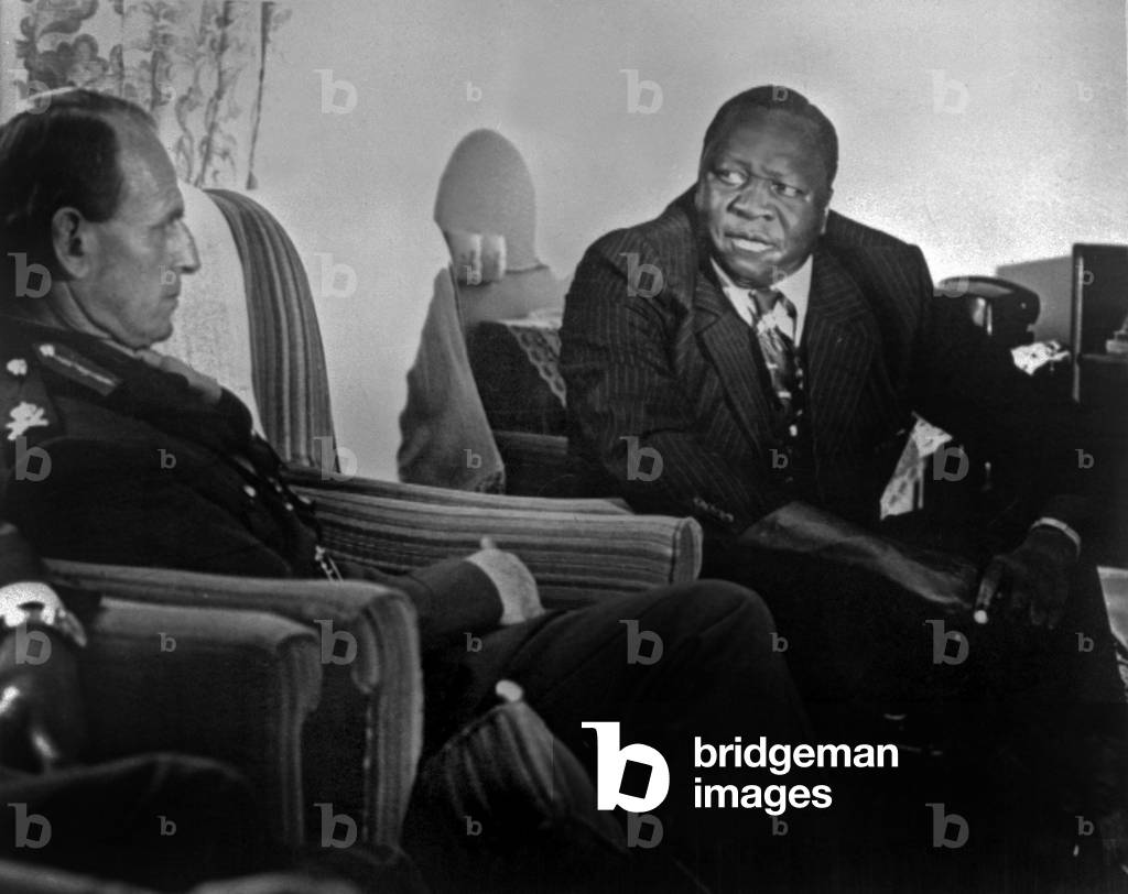 General Idi Amin Dada, President of Uganda speaking with General Blair June 22, 1975 in Uganda